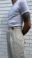 CREAM BEIGE linen high-waisted tapered pants, tapered trousers, custom-made trousers, custom-made pants, men’s high-waisted trousers, men’s high-waisted pants, tailor-made, custom-tailored trousers, tailored fit and high-waisted men's pants. Handmade and designed in Australia, sustainable fair fashion. Made in Australia. High-quality antique wash linen
